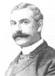 Radierung von Ludwig Levy im Porträt. Levy im Anzug mit markantem Schnauzer.