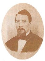 Porträtphotographie von Joseph Martin Reichard im Anzug, mit langem Kinnbart.