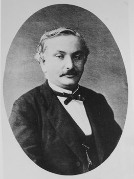 Porträtbiographie von Michel Bréal im Anzug mit Fliege.